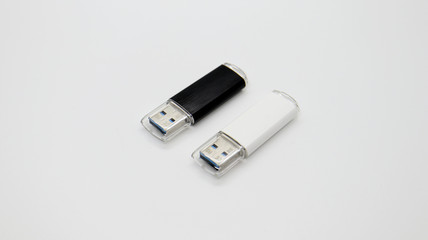 Fototapeta premium White and Black USB Memory on Isolated Background