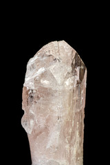 macro mineral stone Danburite on a black background