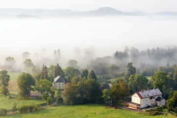 Fototapeta na wymiar Foggy autumn landscape