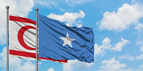 Northern Cyprus and Somalia flag waving in the wind against white cloudy blue sky together. Diplomacy concept, international relations.