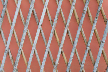 bamboo fence texture on pink background image
