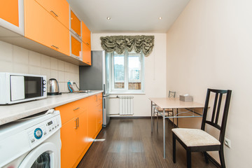 Photo of the light kitchen room