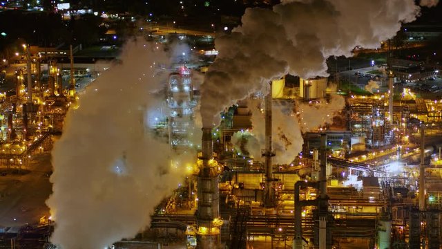 Toledo Ohio Aerial v13 Panning birdseye detail of natural gas and oil refinery industrial cityscape at night - October 2017