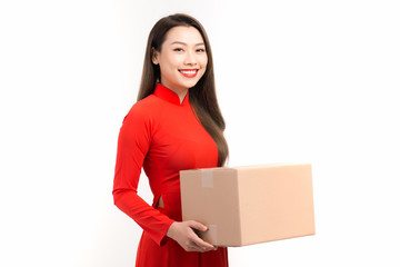Happy chinese new year. Young woman holding gift box