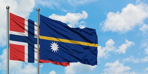 Norway and Nauru flag waving in the wind against white cloudy blue sky together. Diplomacy concept,...