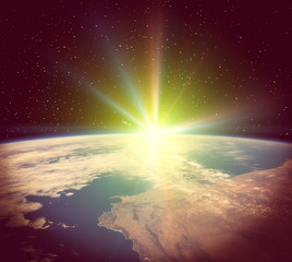 Sunrise on the planet earth. The elements of this image furnished by NASA.