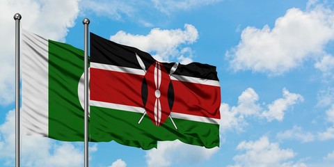 Pakistan and Kenya flag waving in the wind against white cloudy blue sky together. Diplomacy concept, international relations.