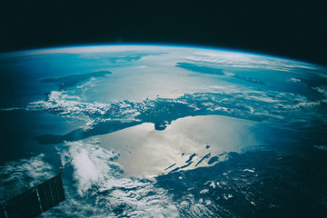 Blue earth, shot in distance. The elements of this image furnished by NASA.