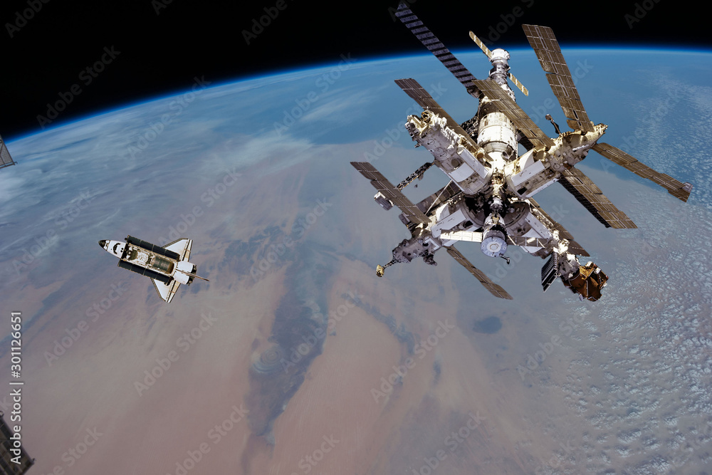 Wall mural spaceships in space. science theme. the elements of this image furnished by nasa.