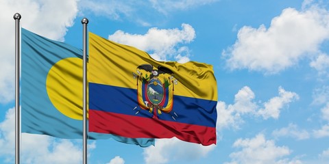 Palau and Ecuador flag waving in the wind against white cloudy blue sky together. Diplomacy concept, international relations.