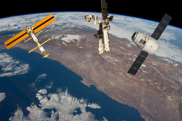 Space station. Different spaceships above the earth. The elements of this image furnished by NASA.