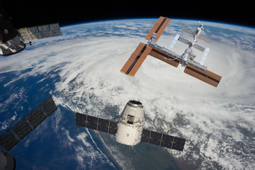 Space station. Different spaceships above the earth. The elements of this image furnished by NASA.