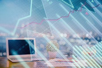 Forex graph hologram on table with computer background. Double exposure. Concept of financial markets.