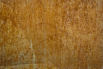 Painted metal rusted background. Metal rust texture. Erosion metal. Scratched and dirty texture on outdoor rusted metal wall.