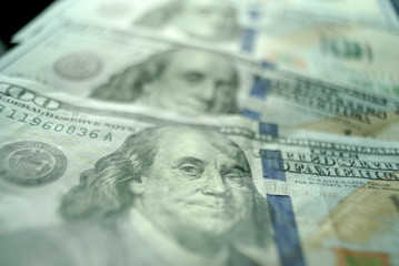 Obraz na płótnie Canvas Dollars Closeup Concept. One Hundred Dollar Banknotes