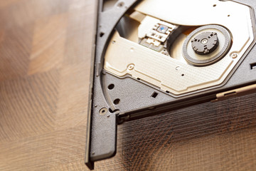 Open the optical drive on a laptop without a drive