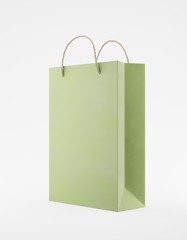 Eco packaging mockup bag kraft paper with handle half side. Standart medium green template on white background promotional advertising. 3D rendering