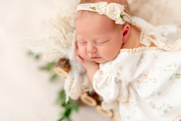 Fototapeta na wymiar Newborn baby girl sleeping