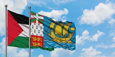 Palestine and Saint Pierre And Miquelon flag waving in the wind against white cloudy blue sky together. Diplomacy concept, international relations.