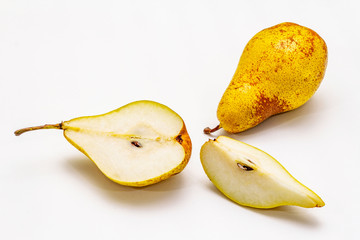 Ripe single pear. Fresh whole fruit, half sliced, seeds. Isolated on white background