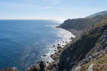 Fototapeta na wymiar cliff by the ocean in sunny day