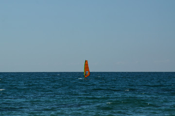 paradise coast windsurfing along the beach extreme sports and relaxation