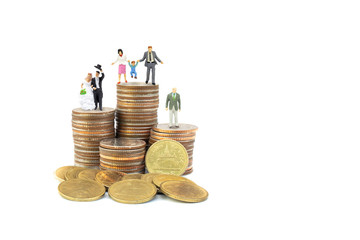 Money Saving and Happy Family Concept : Miniature people as family, couple and businessman place on pile heap stacked silver and golden coins.