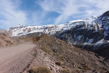 road among the mountains under a blue sky