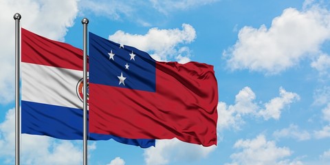 Paraguay and Samoa flag waving in the wind against white cloudy blue sky together. Diplomacy concept, international relations.