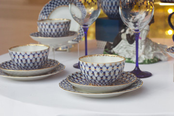 ceramic cup and saucer with a pattern. decor teapots