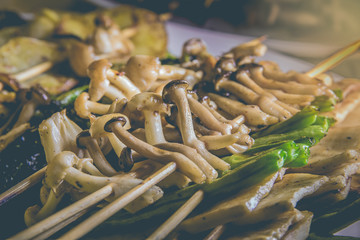 Grilled marinated mushrooms with butter lentils and roasted garlic