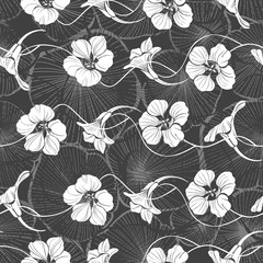Obraz premium Seamless pattern with nasturtium. Monochrome vector illustration.Floral silhouettes on a gray texture background.