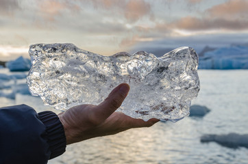 ice floes on the shore of the fontastic Jokulsarlon glacial lagoon on sunset. Southeast Iceland,...