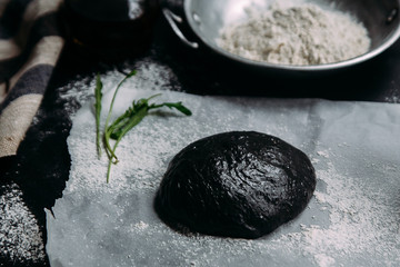 Black pizza dough