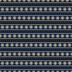 Seamless Christmas pattern with snowflakes and ornamentl lines on blue background.