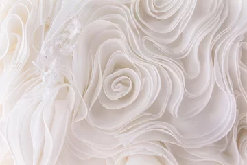 Foto op Canvas Details van de stof van de bruidsjurk en het prachtige borduurconcept dat wordt gebruikt als achtergrond voor illustraties © kaewphoto