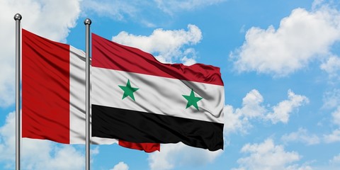 Peru and Syria flag waving in the wind against white cloudy blue sky together. Diplomacy concept,...