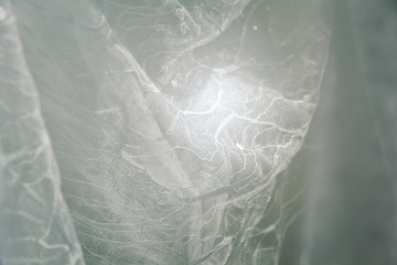 Details of the bride dress fabric and beautiful embroidery wedding concept used as a background for illustrations and text.