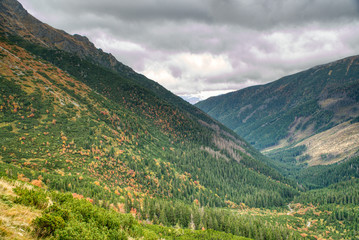 Beautifully cloudy Tatra Mountains in autumn colors