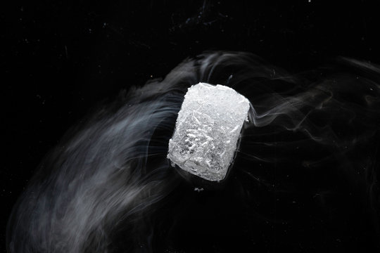 Vaporizing dry ice piece top view