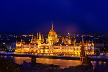 Fototapeta na wymiar Budapest, Hungary - October 01, 2019: Budapest Parliament at night. View of Hungarian Parliament Building, Royal Palace and Danube river.