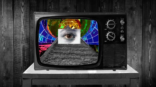 Zoom then fixed shot on retro TV, pyramid eye conspiracy imagery
