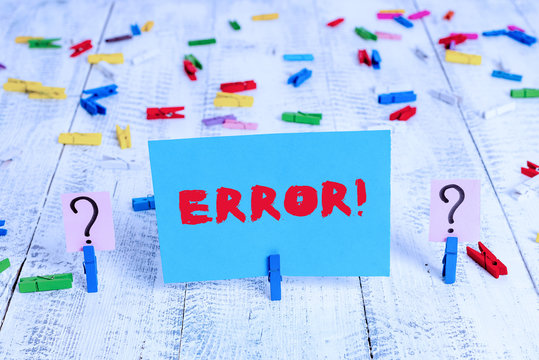 Text sign showing Error. Business photo showcasing state or condition of being wrong in conduct judgement or program Scribbled and crumbling sheet with paper clips placed on the wooden table