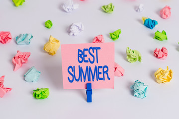 Writing note showing Best Summer. Business concept for weather is warmer and analysisy students get a break from school Colored crumpled paper empty reminder white floor clothespin