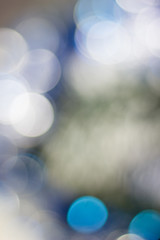 Obraz premium Abstract christmas background, blue colored and blurred.