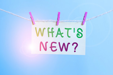 Word writing text What S New Question. Business photo showcasing when you ask someone about his current live events actions Clothesline clothespin rectangle shaped paper reminder white wood desk