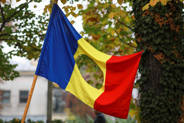 Details with the Romanian flag with a hole, the symbol of the Romanian Revolution from December...