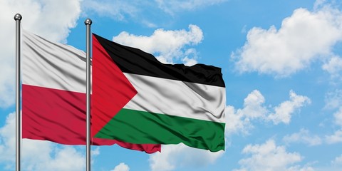 Poland and Palestine flag waving in the wind against white cloudy blue sky together. Diplomacy concept, international relations.