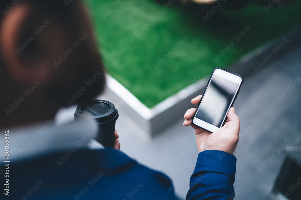 Poster cropped image of man using cellphone device for digital marketing and updating mobile notification f