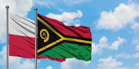 Poland and Vanuatu flag waving in the wind against white cloudy blue sky together. Diplomacy concept, international relations.